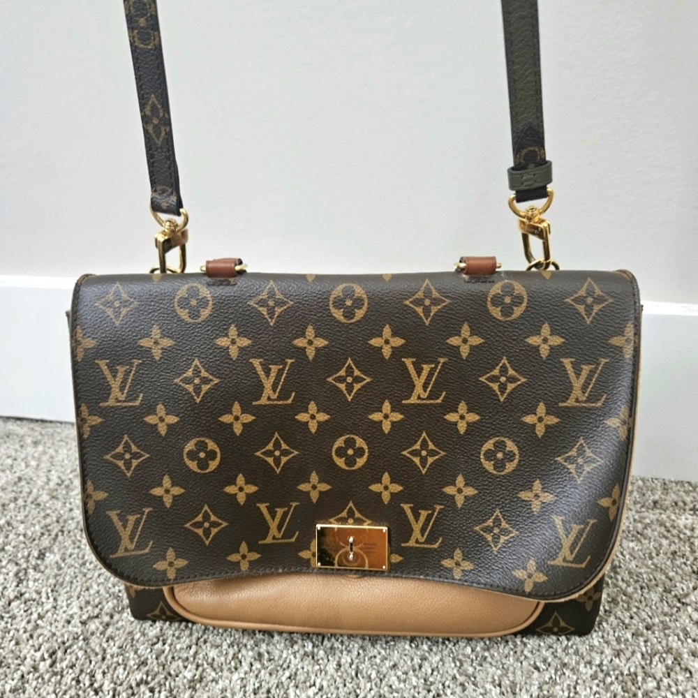 Louis Vuitton Monogram Monceau Handbag. Serial number in the inside pocket.